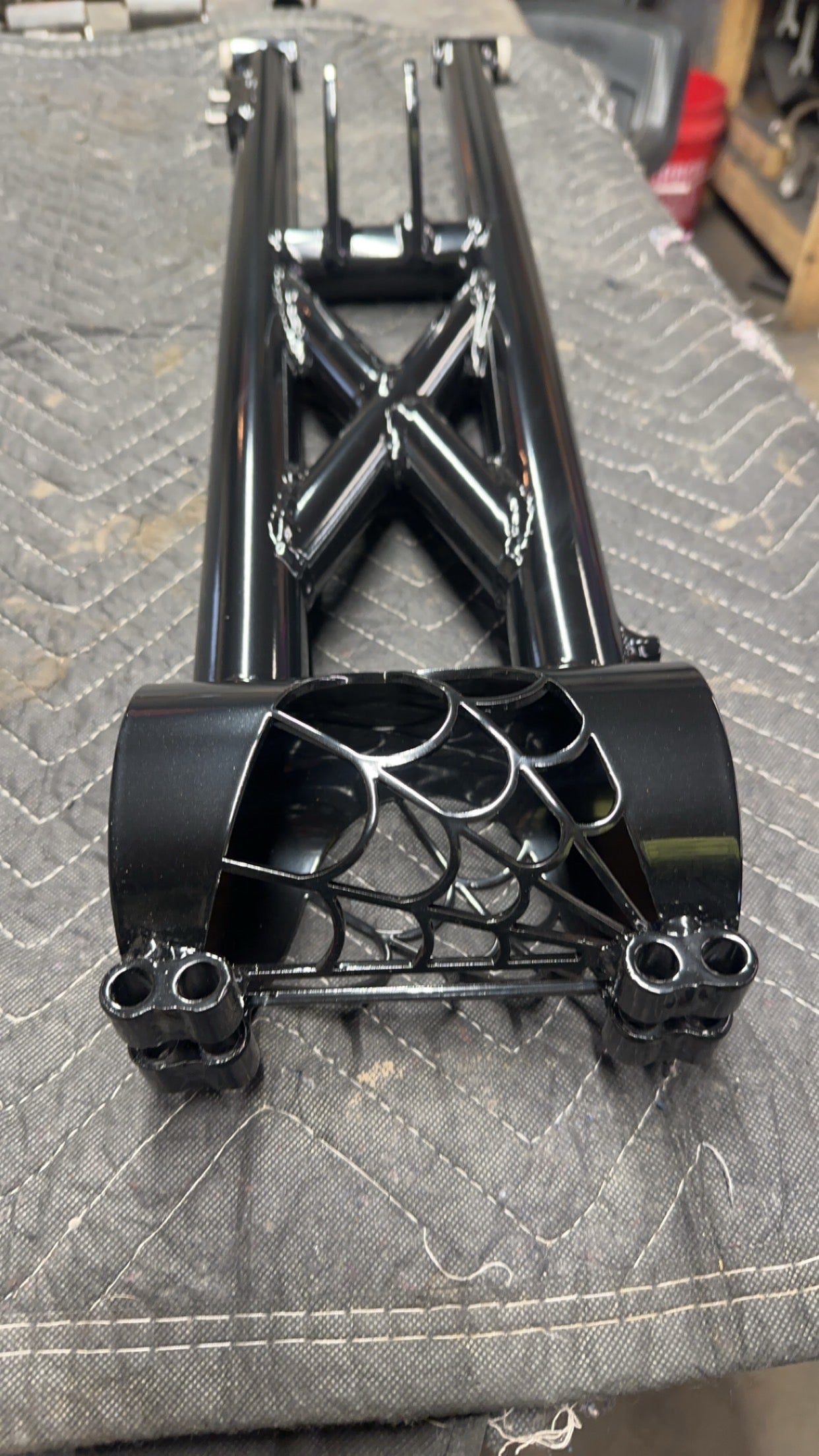 Honda TRX 450 R extended swingarm, custom-built for increased stability, improved traction, and enhanced durability, designed for high-performance off-road riding.